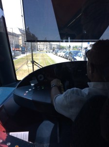 Tram going over grassy tracks, Bordeaux.
