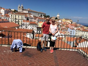 A seller of iPhone selfie holders kindly takes a photo.