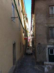 The lanes are impossibly narrow yet cars still try to pass through.
