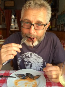 A mouthful of pulpo, a speciality of the region.