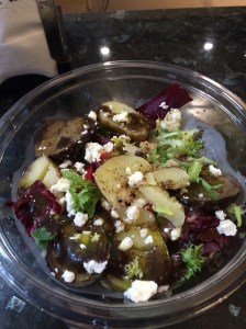 The tired-looking aubergine and feta salad served in a plastic dish at the Viena Cafe.