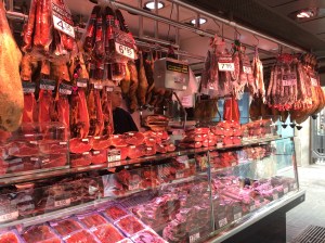 A ham and sausage stall in the covered market off La Rambla.  Pork as well as fish feature highly in Spanish cuisine.