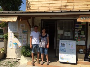 Mam (Mahmoud) and Dominique standing outside the Reception of their charming and superbly-run Camping Villard near Guillestre.