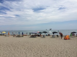 The Pineta campsite beach, with the rig appearing on the horizon.