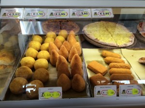 Selection of Pugliese food on offer at the service station in Apricena including the famous 'suppli.