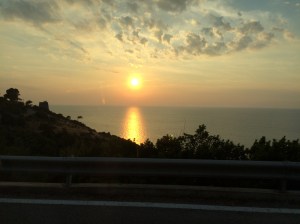 Sun setting as we drive past Peschici in Gargano.  