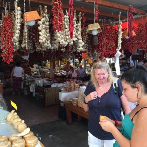 Judith buys some cacciacavallo.