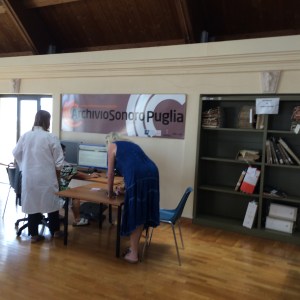 Judith having a go at deciphering the names on the 'Portale degli Antenati'.