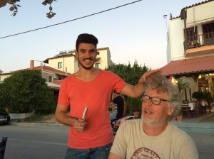 Ari the Albanian ruffling Rob's hair in a show of fondness.