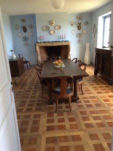 The elegant dining room at Chateau de l'Hestrange.